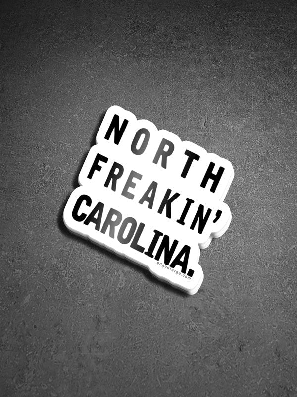 A bold "North Freakin' Carolina" sticker, featuring vibrant text and a fun, playful design, perfect for showing off state pride with a touch of humor.