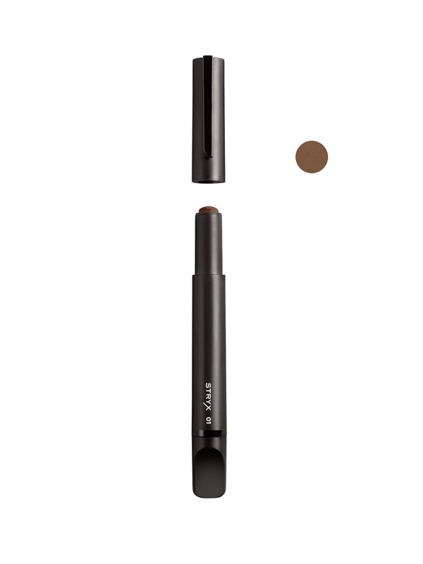 A Men's Concealer Tool in Dark Eclipse, designed to effectively cover blemishes, dark circles, and imperfections with a smooth, natural finish for a flawless look.