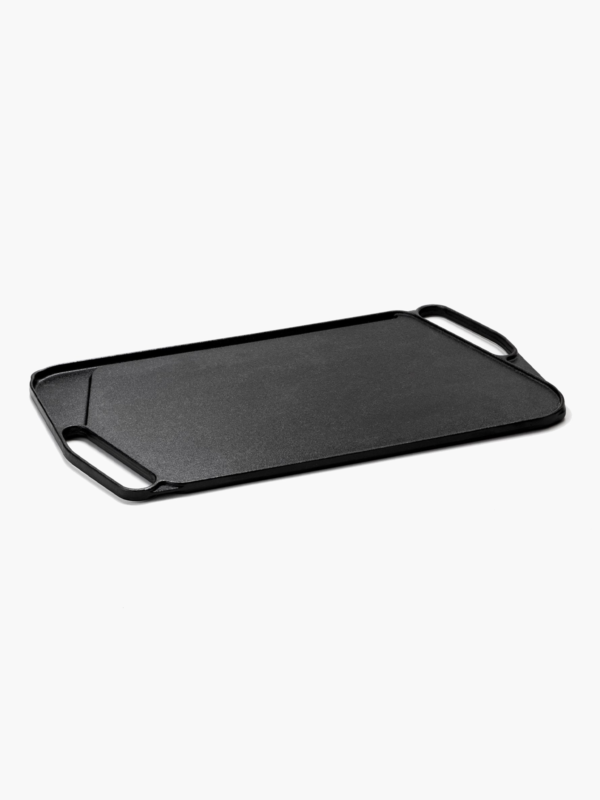 A sturdy Cast Iron Griddle, perfect for evenly cooking a variety of dishes, from pancakes to grilled sandwiches, with excellent heat retention and a long-lasting, durable design.