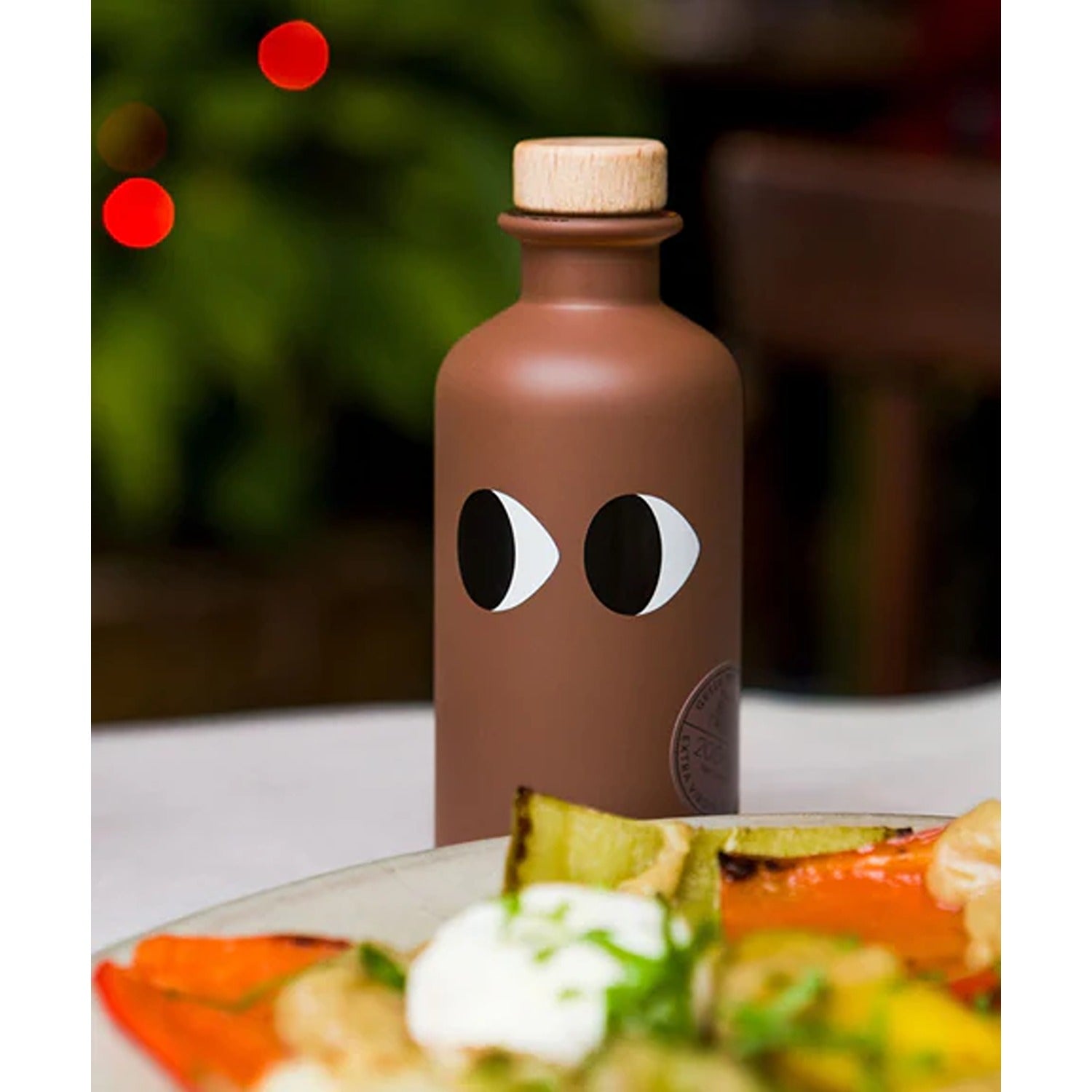 Premium Yiayia & Friends extra virgin olive oil infused with rich, earthy black truffle, perfect for enhancing gourmet dishes with a luxurious depth of flavor.