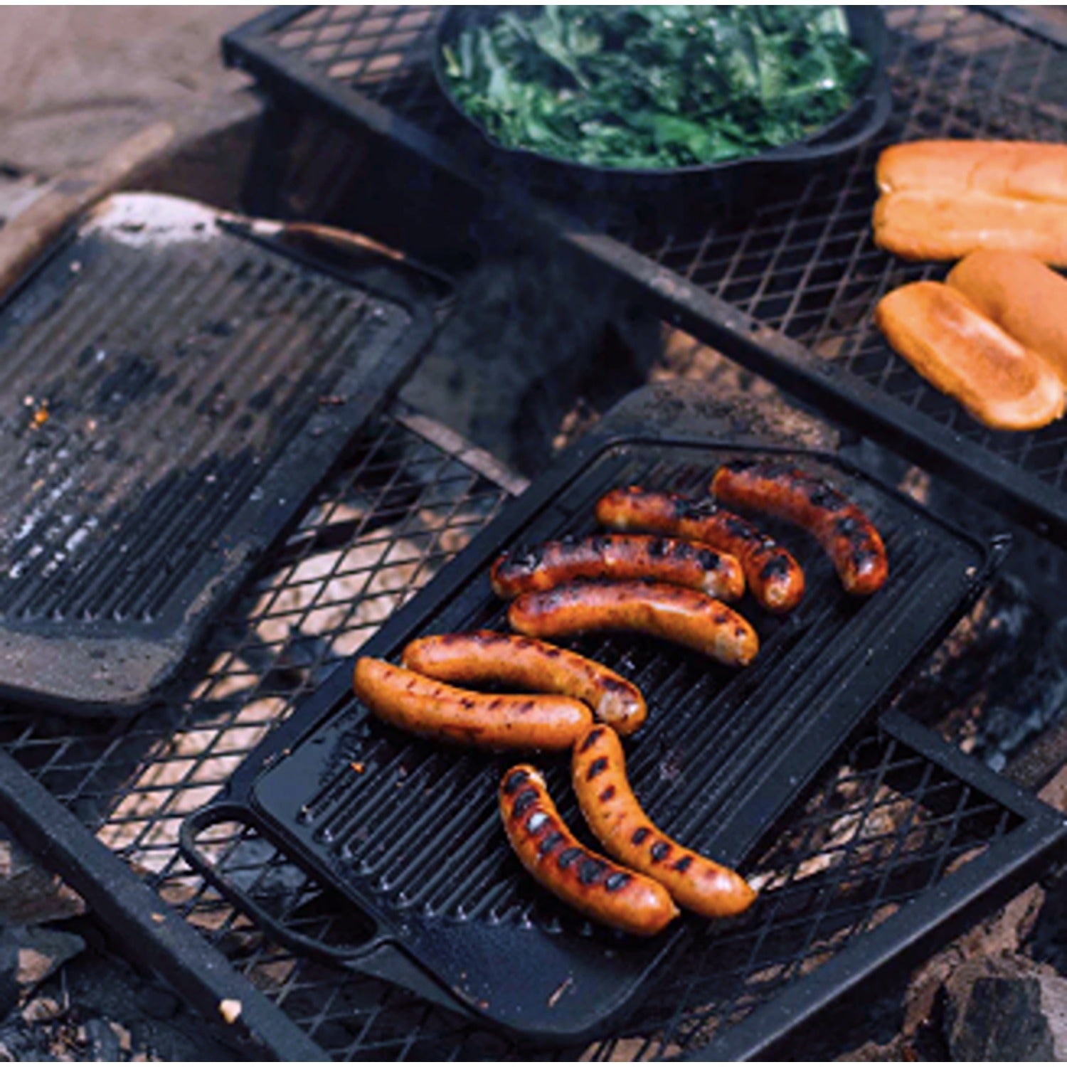 A sturdy Cast Iron Griddle, perfect for evenly cooking a variety of dishes, from pancakes to grilled sandwiches, with excellent heat retention and a long-lasting, durable design.