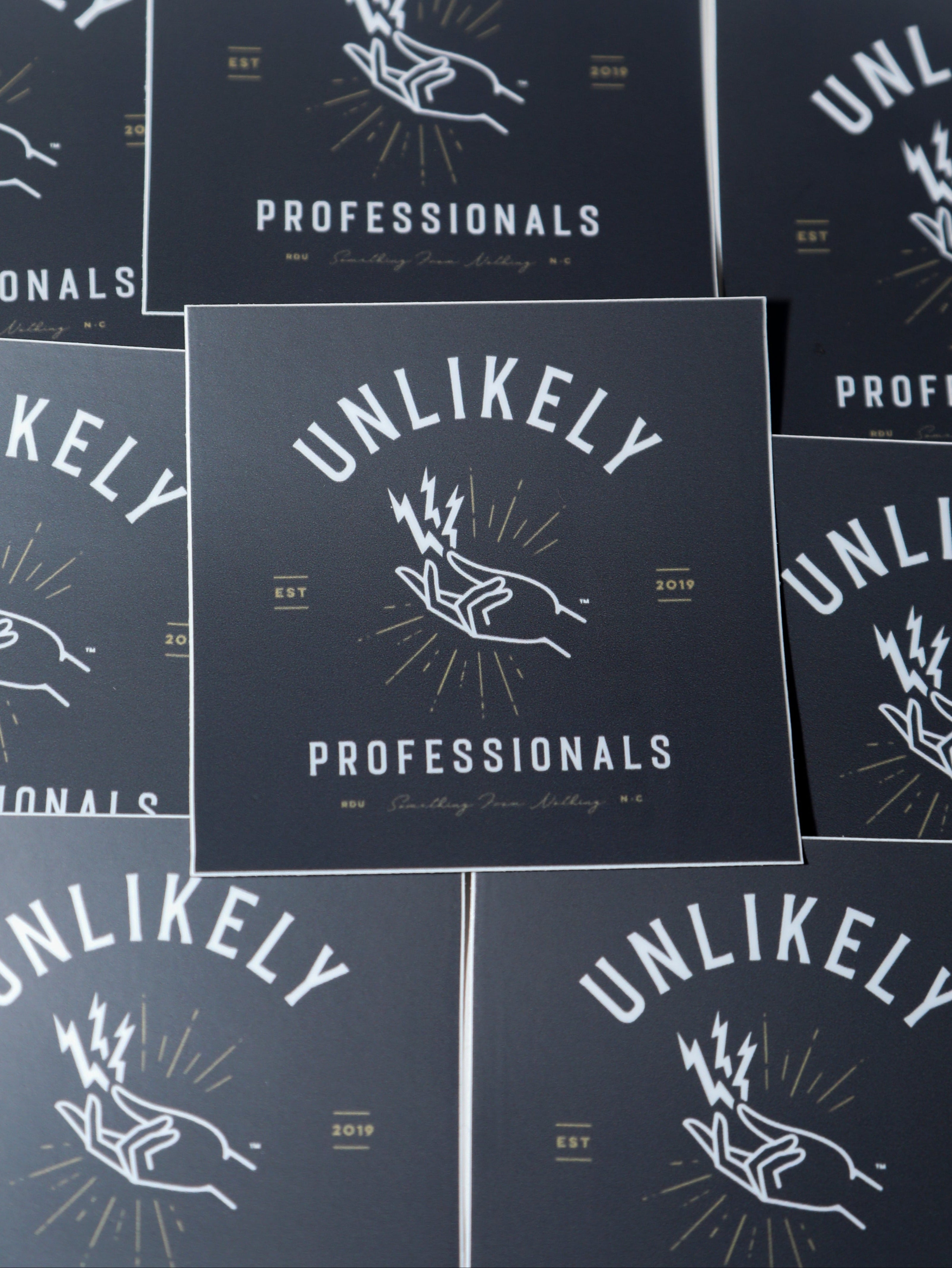 Unlikely Professionals Logo Sticker: Square