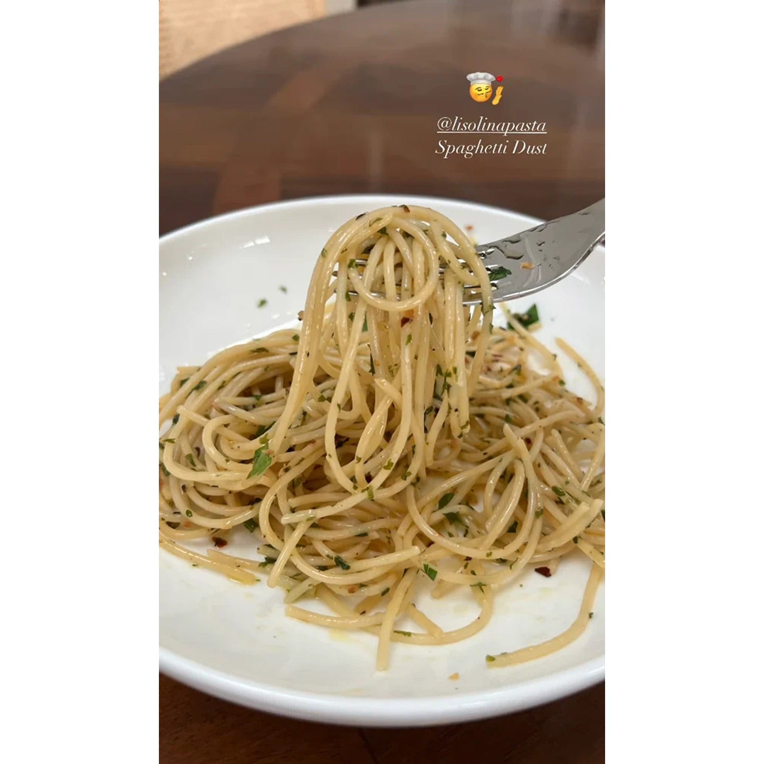 A jar of Spaghetti Dust, a flavorful seasoning blend designed to add a burst of savory spices to your pasta dishes, enhancing the taste of spaghetti or any favorite Italian meal.