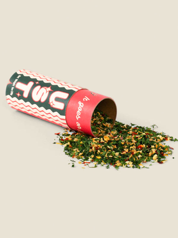 A jar of Spaghetti Dust, a flavorful seasoning blend designed to add a burst of savory spices to your pasta dishes, enhancing the taste of spaghetti or any favorite Italian meal.