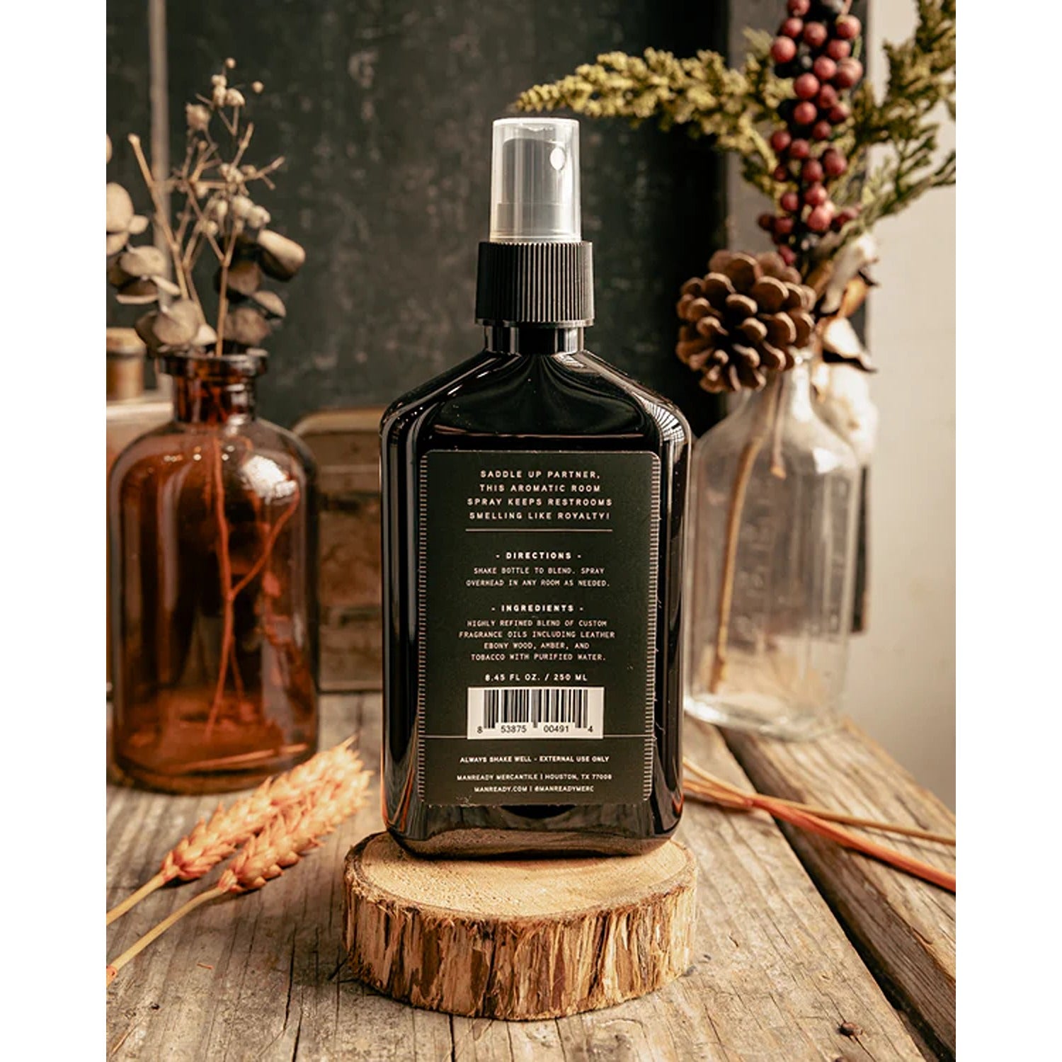 Throne Spray in Saddle Leather scent, a luxurious room mist with warm, rich notes of aged leather and rustic charm.